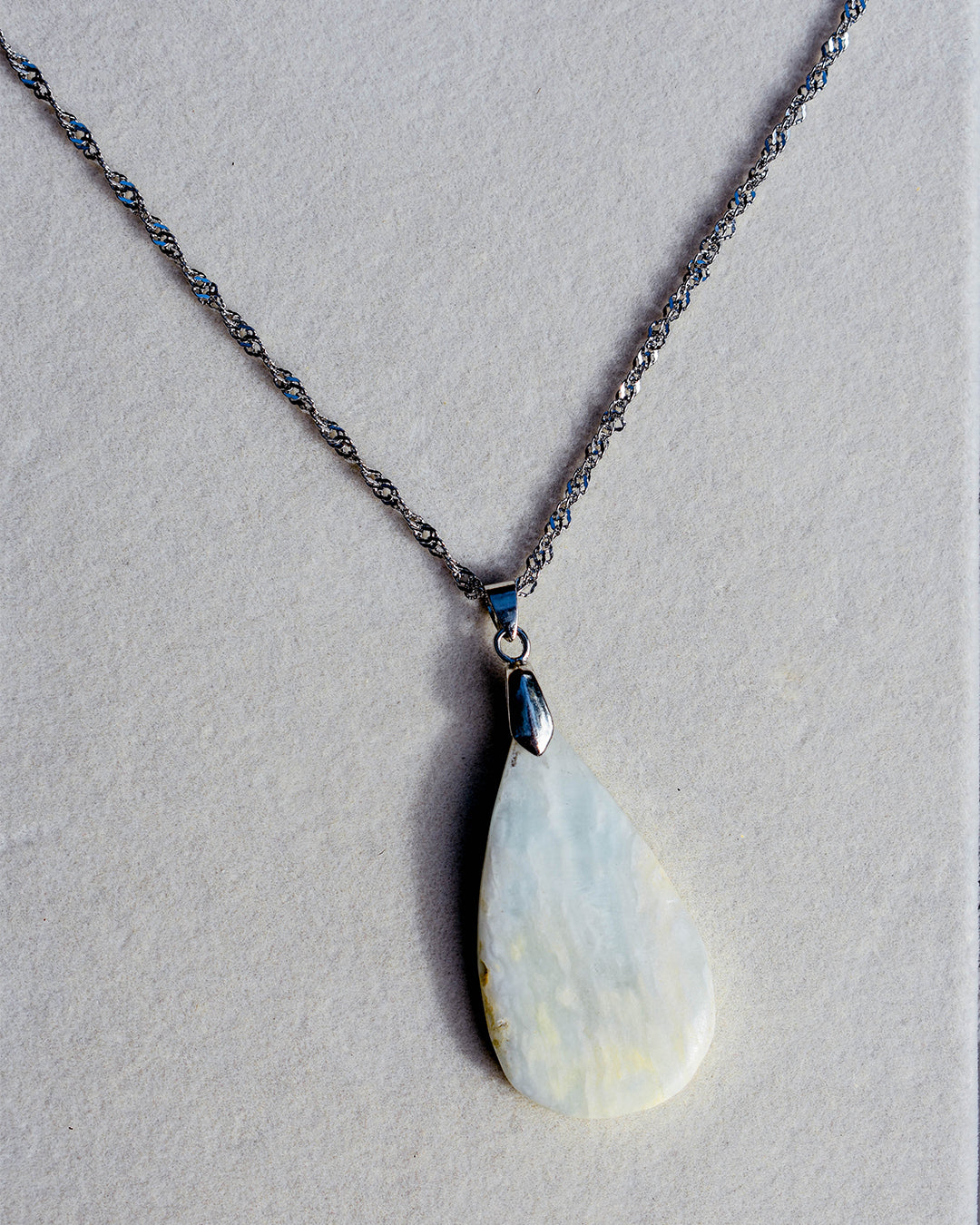 Stainless Steel chain with Caribbean Blue Calcite crystal pendant