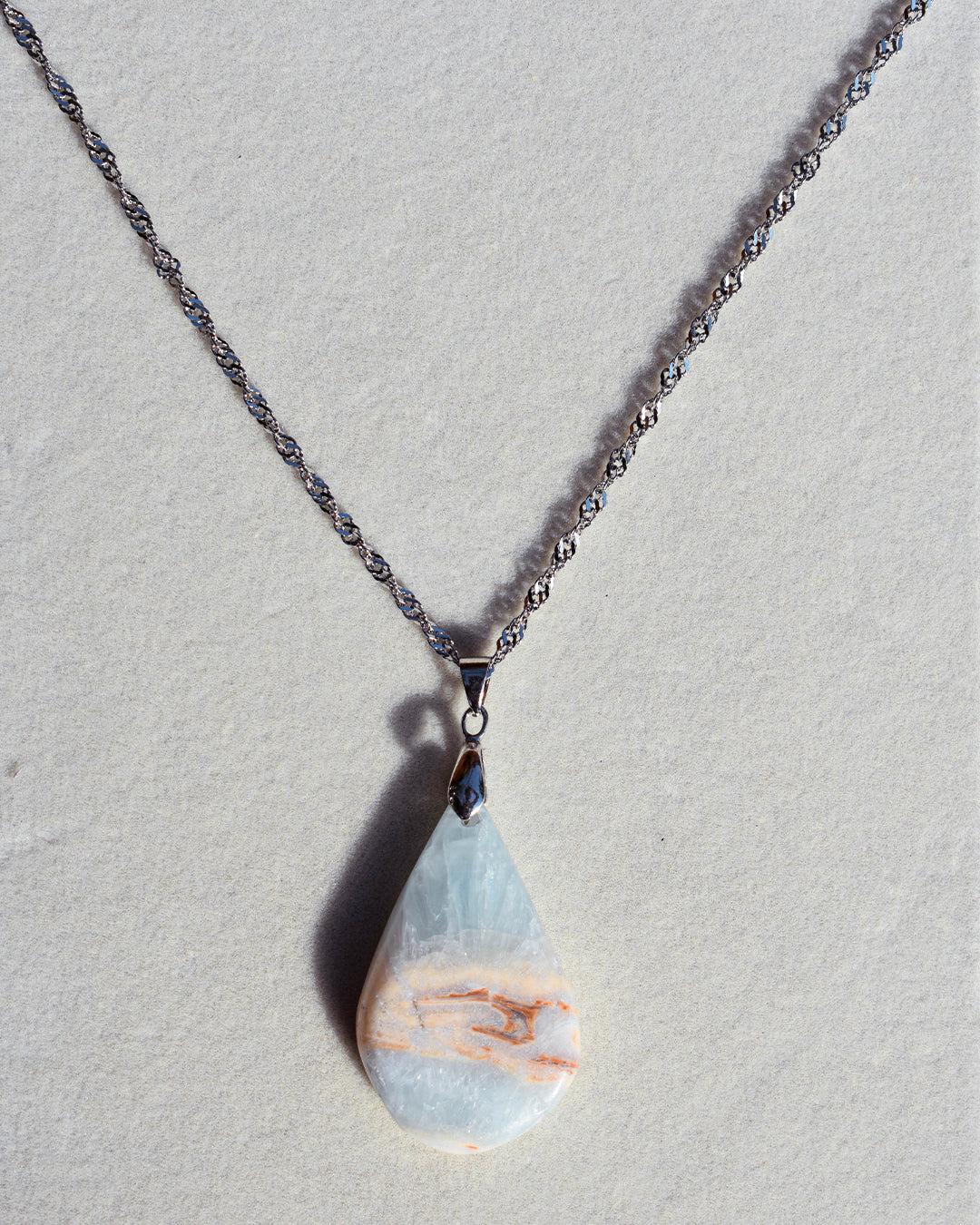 Stainless Steel chain with Caribbean Blue Calcite crystal pendant